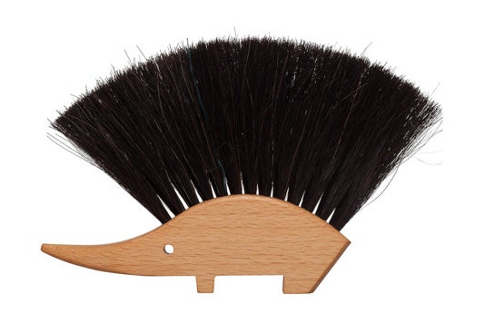 Table brush shaped like a hedgehog.